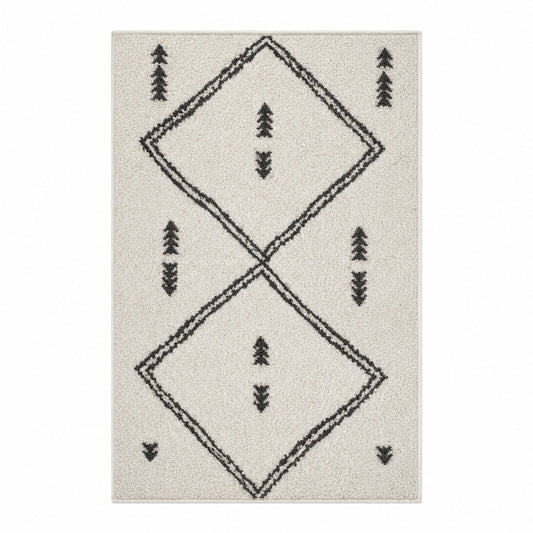 Vue de dessus tapis berbère Beni Ouarain ivoire motifs géométriques noirs